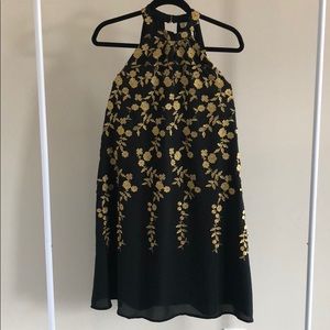 Black and gold cocktail dress